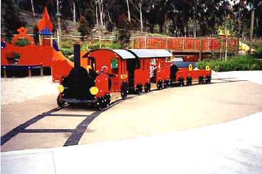 photo of train ride with accessible surfacing designed to appear like train tracks