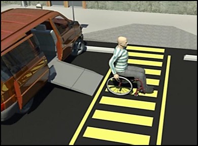 Person using wheelchair exiting van with ramp parking in accessible van space.  